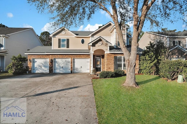 traditional home featuring concrete driveway, an attached garage, a front lawn, and roof with shingles