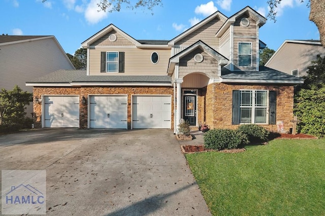 view of front of home featuring a garage, stone siding, concrete driveway, and a front lawn