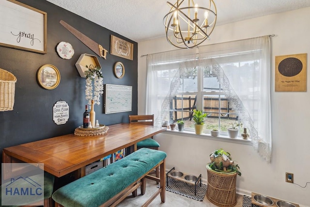 dining space featuring an inviting chandelier