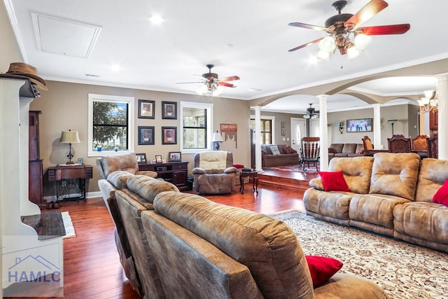 195 Linden Dr, Jesup, GA 31545 - living room featuring ornamental molding, wood finished floors, a ceiling fan, decorative columns, and arched walkways