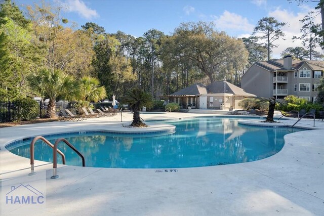 pool with a patio
