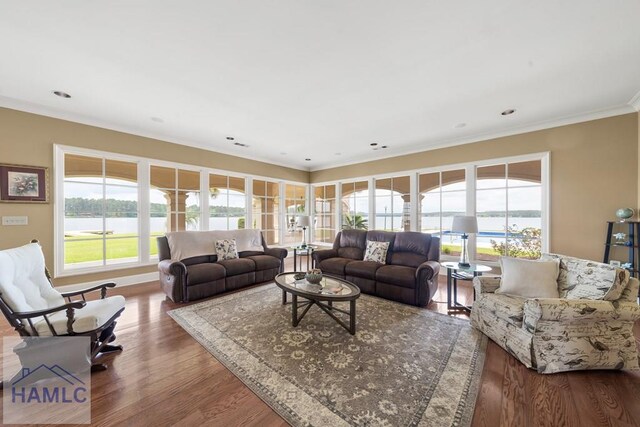 745 Chickasaw Trl, Sparta, GA 31087 - living area with ornamental molding, wood finished floors, and a water view