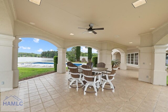 745 Chickasaw Trl, Sparta, GA 31087 - view of patio / terrace featuring ceiling fan, outdoor dining area, and a water view