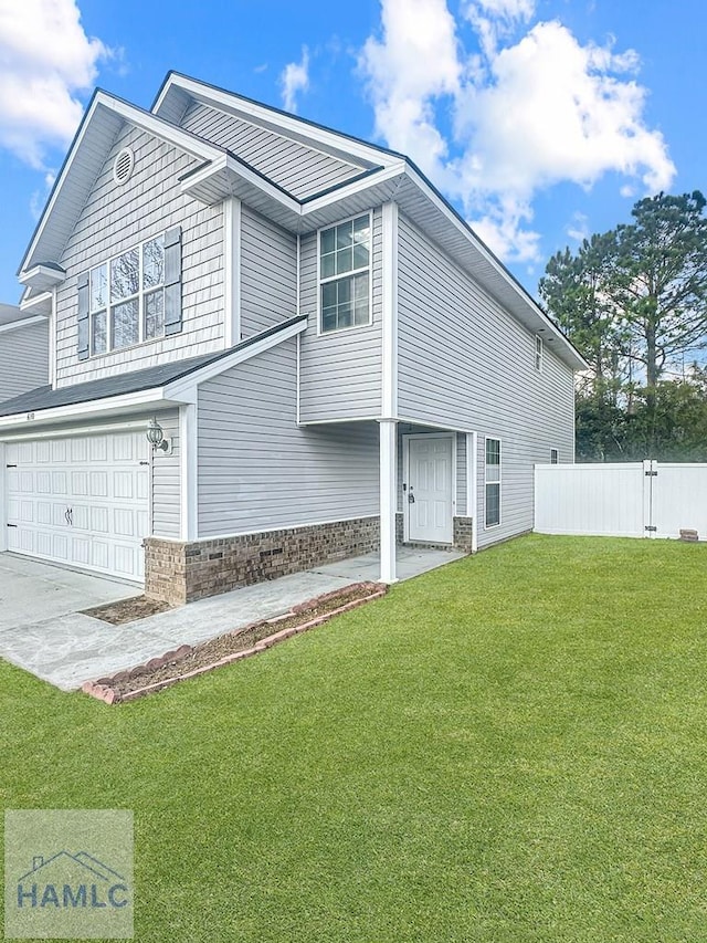 view of side of property featuring a garage and a lawn