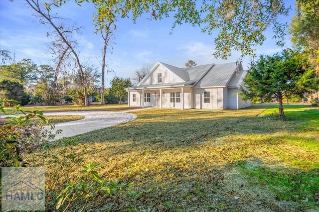 view of front of home with a front yard