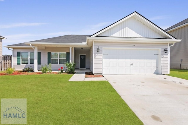 568 Abode Ave, Hinesville, GA 31313 - view of front of house featuring a garage and driveway