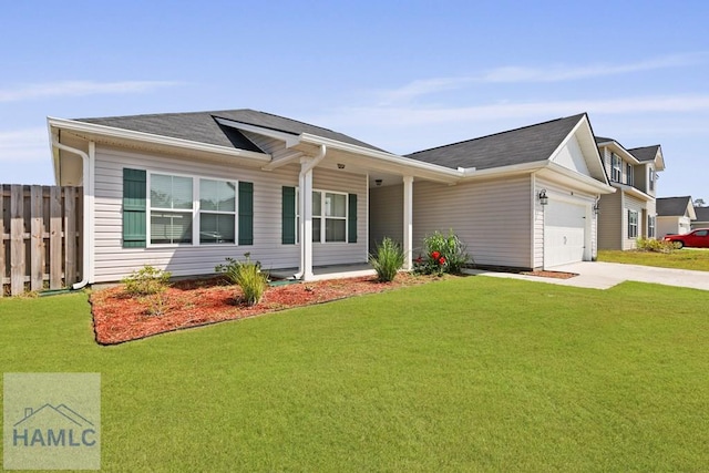 568 Abode Ave, Hinesville, GA 31313 - view of front of home with concrete driveway, an attached garage, and covered porch