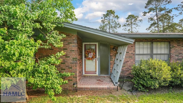 314 Twin Parks Dr, Jesup, GA 31545 - doorway to property with brick siding