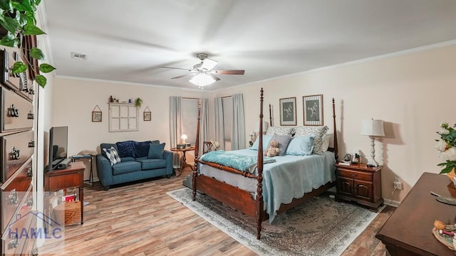314 Twin Parks Dr, Jesup, GA 31545 - bedroom featuring light wood-style flooring, ornamental molding, and a ceiling fan