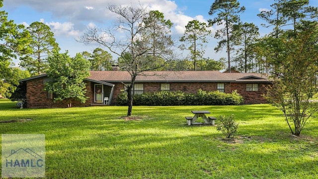 314 Twin Parks Dr, Jesup, GA 31545 - ranch-style home with a front yard and brick siding