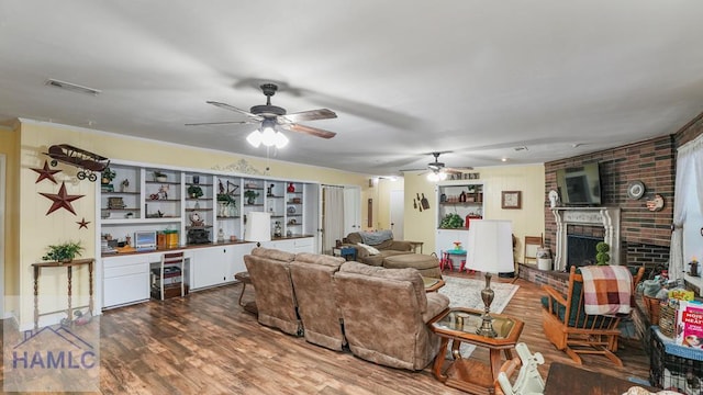 314 Twin Parks Dr, Jesup, GA 31545 - living room with a ceiling fan, wood finished floors, and a brick fireplace