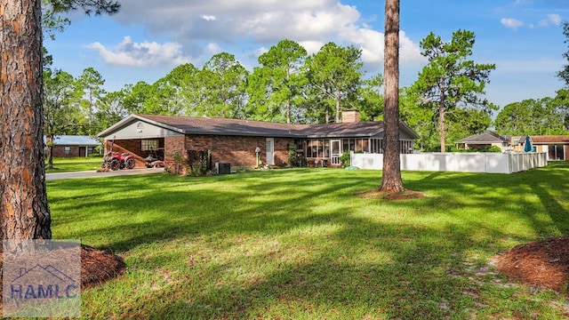 314 Twin Parks Dr, Jesup, GA 31545 - view of front of property with a chimney and brick siding