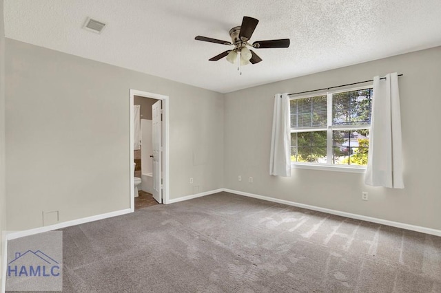 65 W Kenny Dr, Hinesville, GA 31313 - spare room with carpet, a ceiling fan, and a textured ceiling