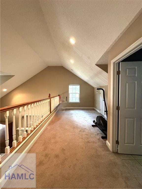 440 Arnold River Rd, Jesup, GA 31545 - bonus room featuring carpet floors, vaulted ceiling, a textured ceiling, and recessed lighting