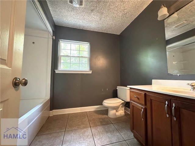 440 Arnold River Rd, Jesup, GA 31545 - full bathroom with vanity, a textured ceiling, tile patterned flooring, and shower / washtub combination