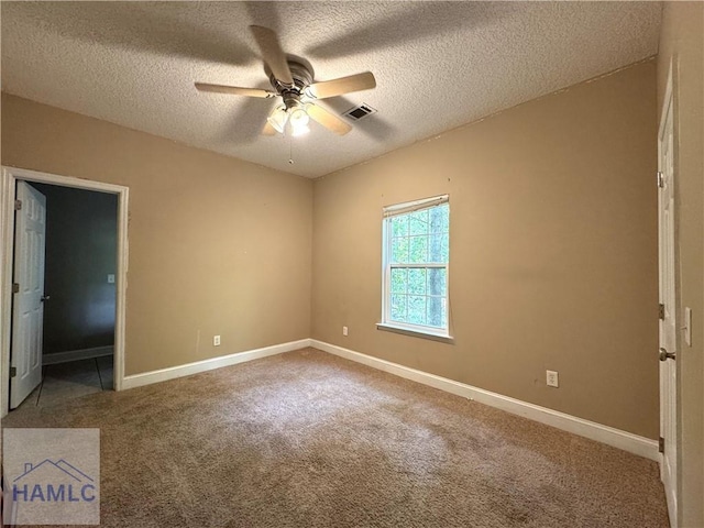 440 Arnold River Rd, Jesup, GA 31545 - carpeted empty room with a ceiling fan and a textured ceiling