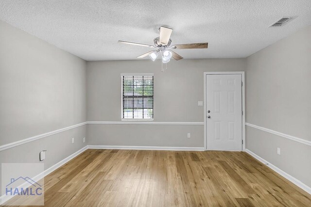 197 Sequoia Cir, Hinesville, GA 31313 - spare room with light wood-type flooring, baseboards, and a ceiling fan