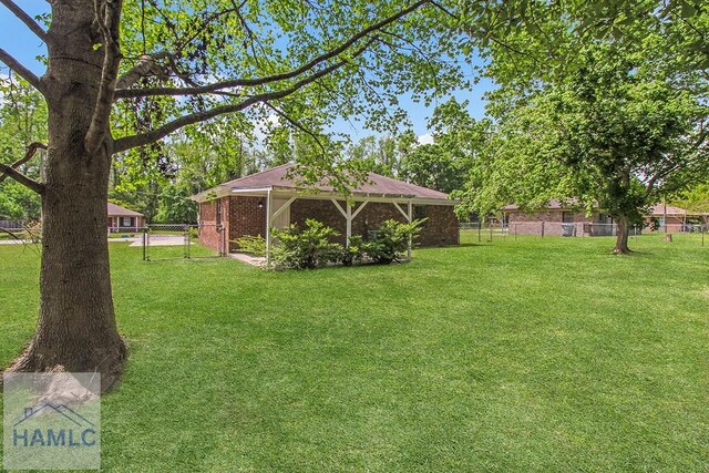 197 Sequoia Cir, Hinesville, GA 31313 - view of yard with fence and a gate