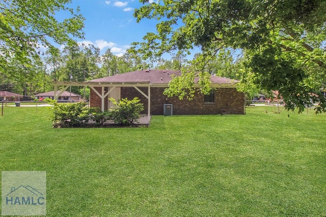 197 Sequoia Cir, Hinesville, GA 31313 - view of yard featuring central AC