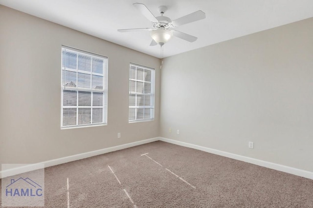 empty room with carpet and ceiling fan