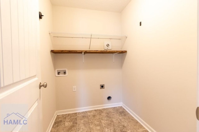 laundry room with electric dryer hookup and washer hookup