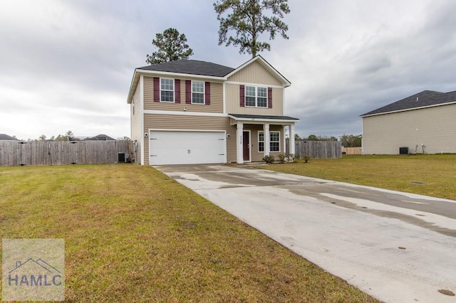 view of front of property with a front lawn, cooling unit, and a garage