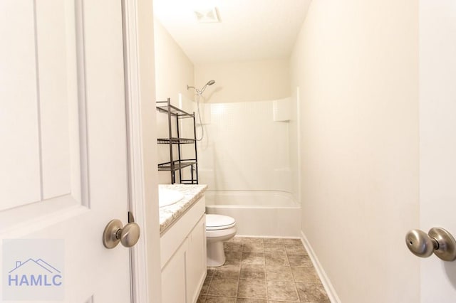 full bathroom with tile patterned floors, vanity, shower / bath combination, and toilet