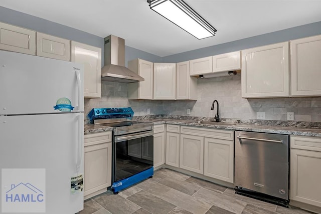 654 Mcdowell Rd, Hinesville, GA 31313 - kitchen featuring stainless steel appliances, wall chimney exhaust hood, a sink, and backsplash