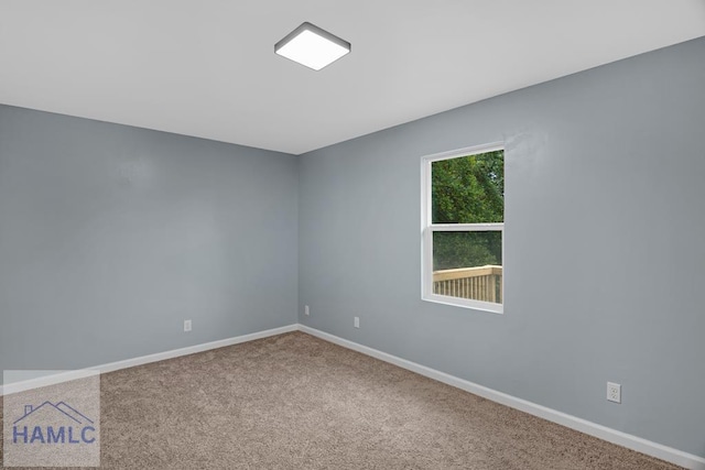 654 Mcdowell Rd, Hinesville, GA 31313 - unfurnished room with baseboards and carpet floors
