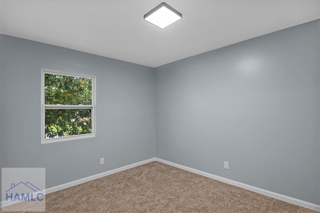 654 Mcdowell Rd, Hinesville, GA 31313 - carpeted spare room with baseboards
