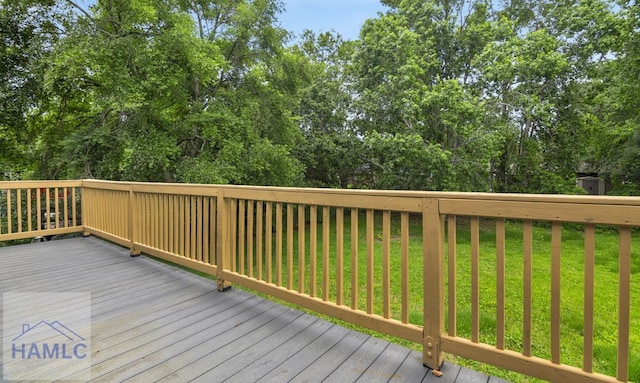 654 Mcdowell Rd, Hinesville, GA 31313 - wooden deck with a yard