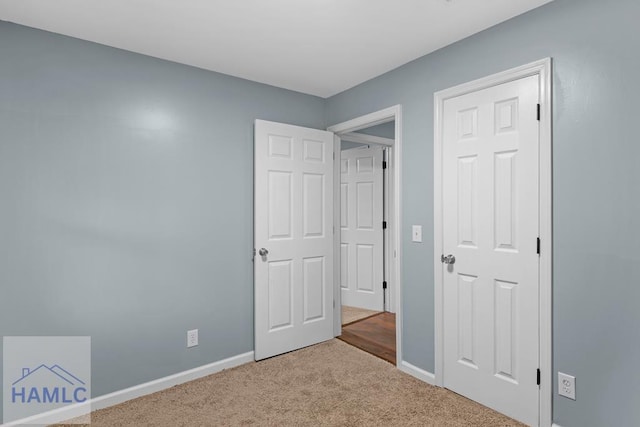 654 Mcdowell Rd, Hinesville, GA 31313 - unfurnished bedroom with carpet and baseboards