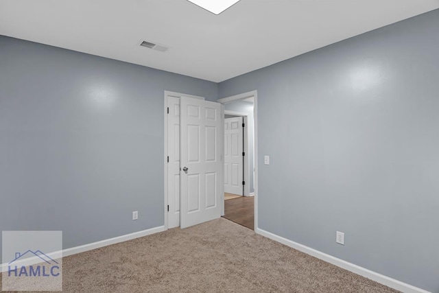 654 Mcdowell Rd, Hinesville, GA 31313 - unfurnished bedroom featuring baseboards and carpet