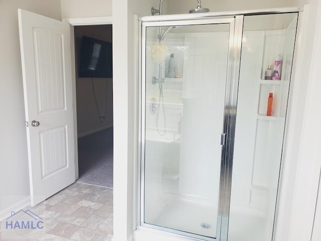 bathroom with an enclosed shower