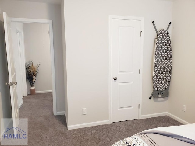 bedroom with light colored carpet