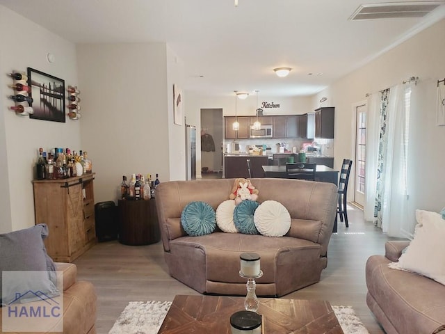 living room featuring light wood-type flooring