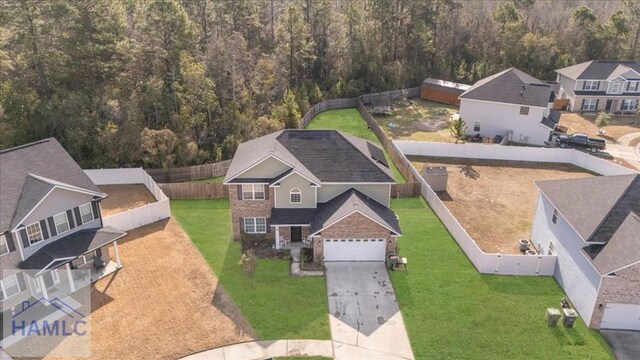 732 Waterlily Ct, Hinesville, GA 31313 - drone / aerial view with a residential view and a view of trees