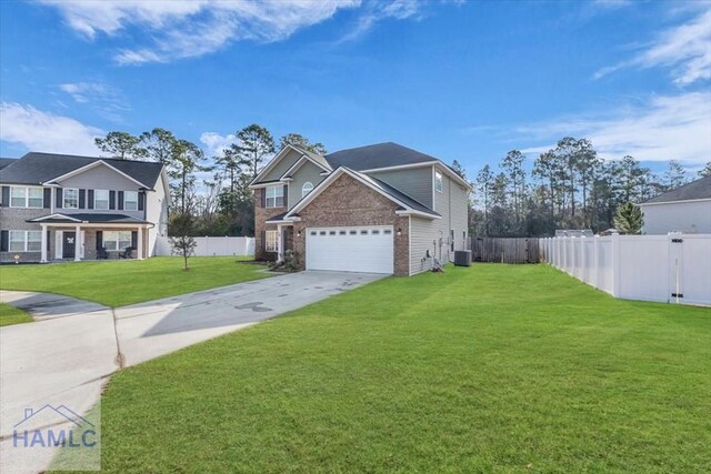 732 Waterlily Ct, Hinesville, GA 31313 - view of home's exterior with cooling unit, driveway, a yard, and fence
