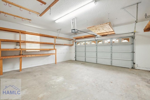 301 Marsh View Dr, Richmond Hill, GA 31324 - garage featuring a garage door opener