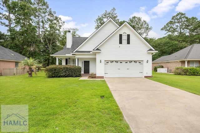 301 Marsh View Dr, Richmond Hill, GA 31324 - traditional home with a chimney, driveway, a front lawn, and an attached garage