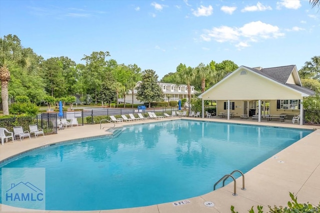 301 Marsh View Dr, Richmond Hill, GA 31324 - community pool with a patio