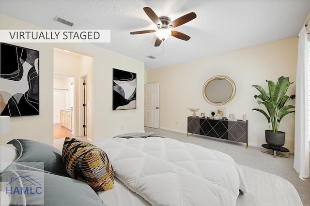 301 Marsh View Dr, Richmond Hill, GA 31324 - carpeted bedroom with connected bathroom and ceiling fan
