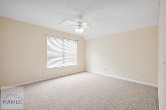 301 Marsh View Dr, Richmond Hill, GA 31324 - spare room with attic access, carpet, ceiling fan, and a textured ceiling