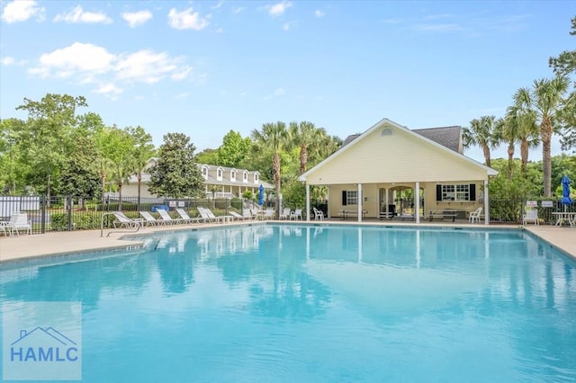 301 Marsh View Dr, Richmond Hill, GA 31324 - community pool with a patio area