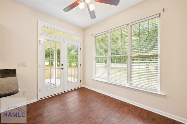 301 Marsh View Dr, Richmond Hill, GA 31324 - entryway featuring french doors, dark wood finished floors, a ceiling fan, and plenty of natural light