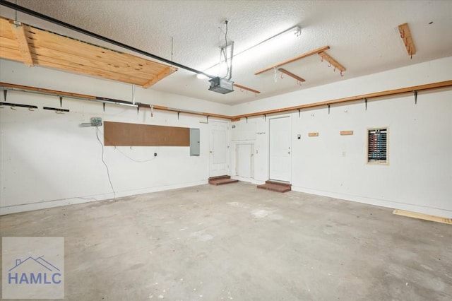301 Marsh View Dr, Richmond Hill, GA 31324 - garage with a garage door opener and electric panel