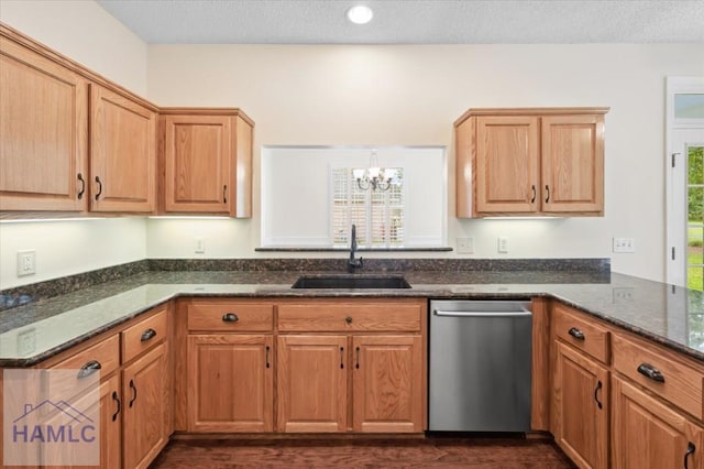 301 Marsh View Dr, Richmond Hill, GA 31324 - kitchen with dishwasher, a chandelier, dark wood-type flooring, dark stone counters, and a peninsula