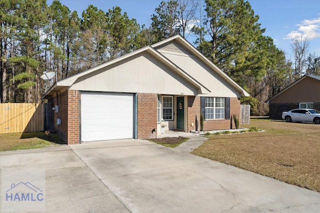 ranch-style home with a front yard and a garage