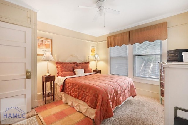 661 E Plum St, Jesup, GA 31546 - bedroom featuring carpet flooring, ornamental molding, and a ceiling fan