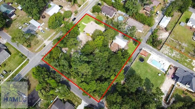 661 E Plum St, Jesup, GA 31546 - aerial perspective of suburban area with property boundaries highlighted